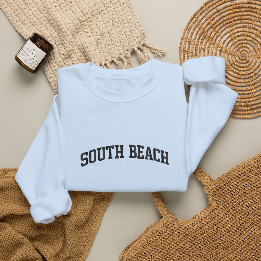 South Beach Crewneck Sweatshirt — Classic White Pullover with 'South Beach' Text
