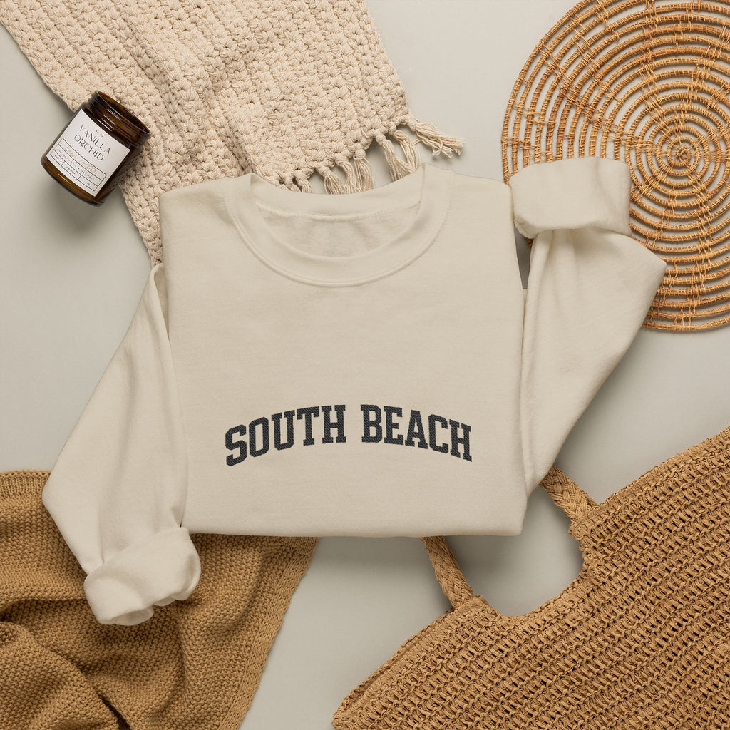 South Beach Crewneck Sweatshirt — Classic White Pullover with 'South Beach' Text