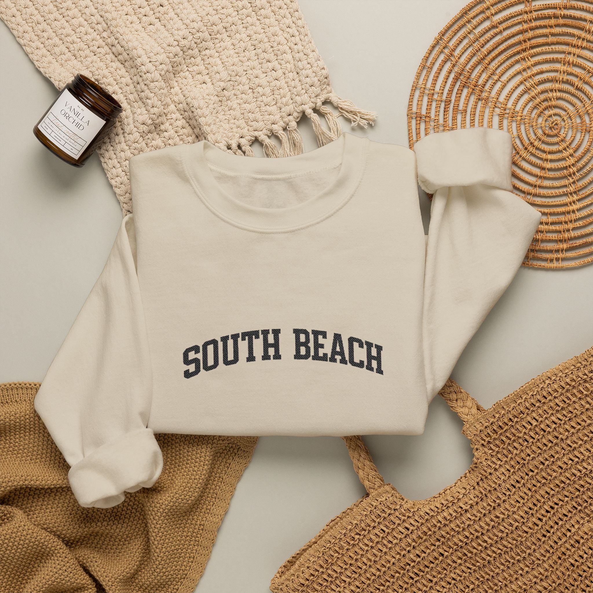 South Beach Crewneck Sweatshirt — Classic White Pullover with 'South Beach' Text