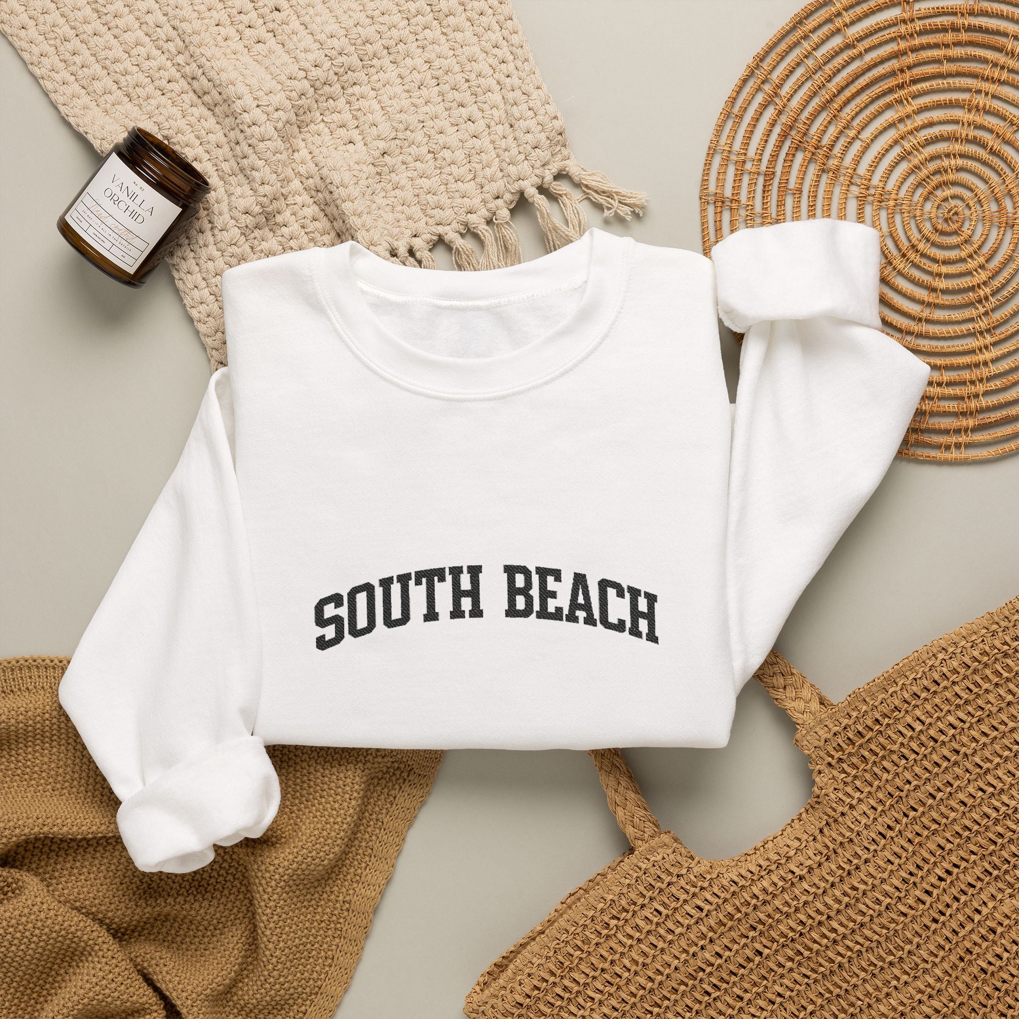 South Beach Crewneck Sweatshirt — Classic White Pullover with 'South Beach' Text